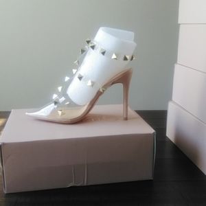 Brand New clear heels with gold studs still in box
